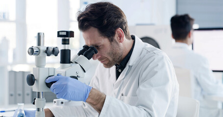 Microscope, research and medical with man in laboratory for results, gene therapy and test. Science sample, dna sequence editor and vaccine trial with male person in clinic for healthcare study