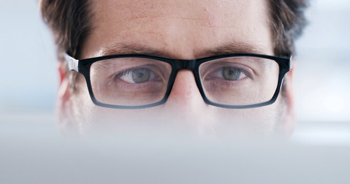 Reading, glasses and laptop with business man in office for planning, webpage designer and app review. Developer solutions, client feedback and research with person in agency for project and startup