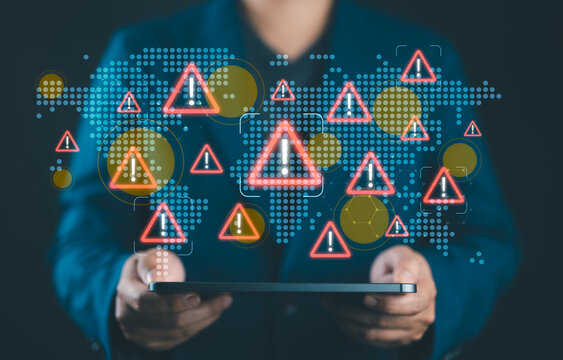 Geopolitical risks and global instability concept with businessperson holding world map and warning icons, assessing impact of international conflict, trade wars, and economic uncertainty.