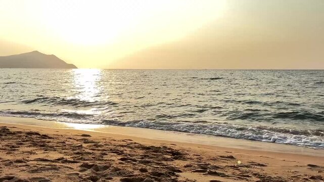 The sunset atmosphere at Bang Ha Rae Beach, Chonburi Province, Thailand.