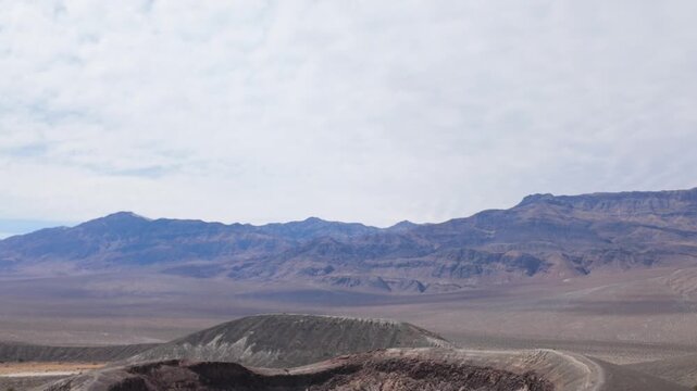 Gimbal close-up booming down shot of Little Hebe Crater in Death Valley, California. 4K