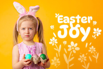 Fototapeta premium Child holds Easter eggs with bunny ears and yellow background showing joyful message about Easter