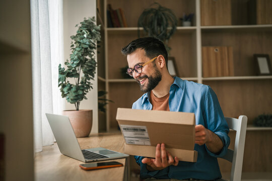 Man receiving package for home online shopping delivery