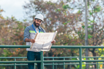 Fototapeta premium Engineer Presenting Railway Expansion Plan to Investor