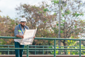 Fototapeta premium Engineer Presenting Railway Expansion Plan to Investor