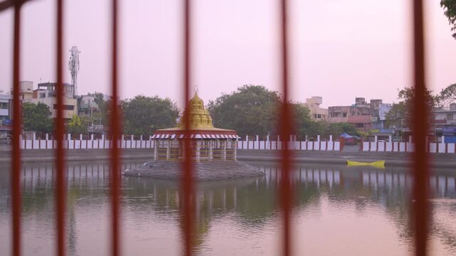 Sacred Temple Pavilion Surrounded by Water in Tamil Nadu