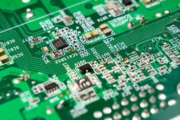 Obraz premium Close-up of a part of an electronic circuit board with electronic components