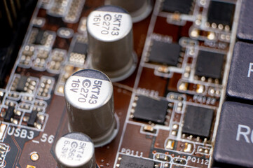 Close-up of a part of an electronic circuit board with electronic components