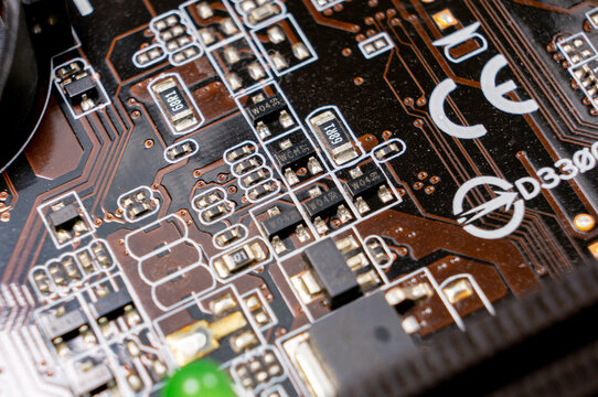 Close-up of a part of an electronic circuit board with electronic components