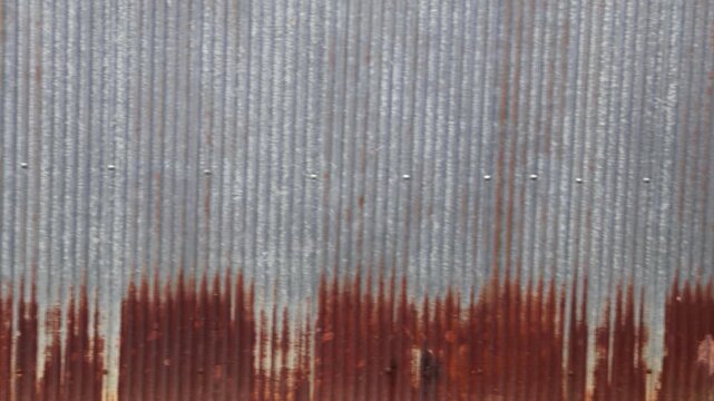 Old metal sheet roof texture. Pattern of old metal sheet. Rusty tin texture