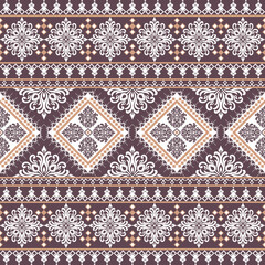Seamless ethnic damask and geometric pattern in brown and white
