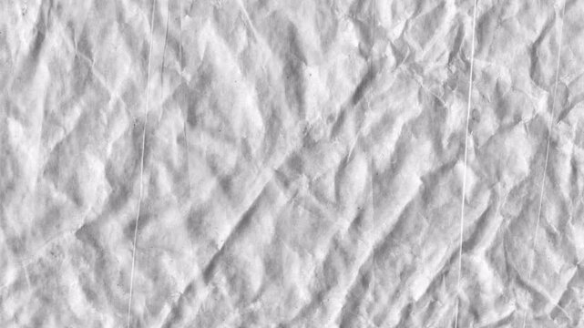 Crumpled White Paper Texture Background with Natural Wrinkles and Realistic Surface Detail
