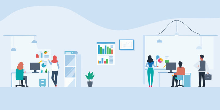 Modern office space with employees working at desks and collaborative areas