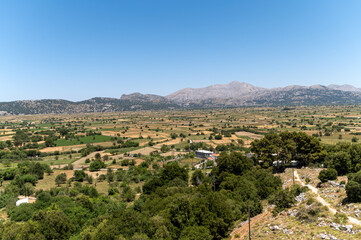 Fototapeta premium Exploring the scenic beauty of Lasithi Plateau in Crete, Greece on a clear day