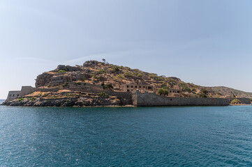 Explore spinalonga island's rich history in crete, greece on a clear day