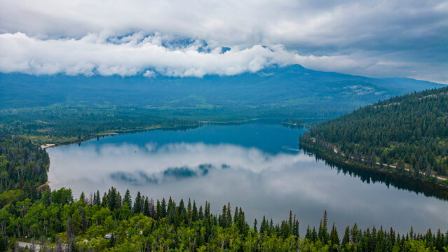 Aerial view of Pyramid Lake with mountains and forest in Jasper Alberta