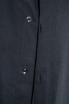 Tejido de camisa negra con botones
