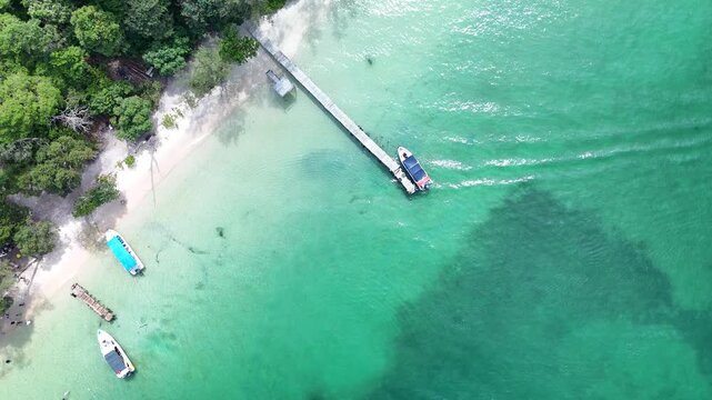Starfish Beach (Rach Vem), Phu Quoc Island, An Giang (Kien Giang), Vietnam &ndash; 4k aerial drone footage of tropical beaches, turquoise water, white sand beach, wooden pier, fishing boats, coastal forest