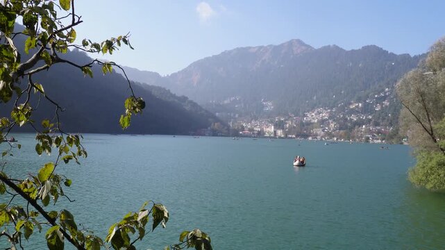 Hills Wrapped in Rippling Water Lights