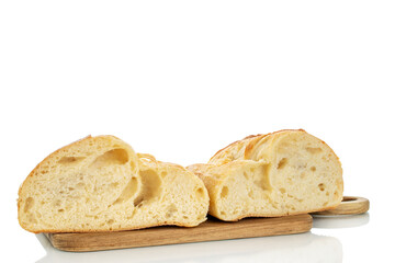 White wheat bun isolated on white background, macro.