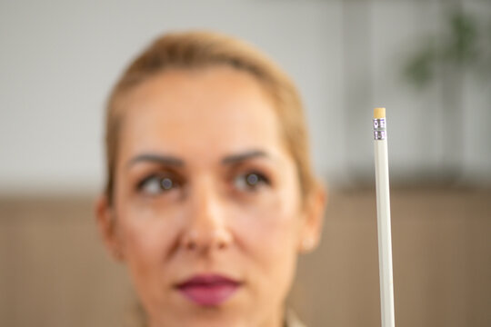 Pen movement directing eye tracking during EMDR to support bilateral stimulation and trauma processing. Highlights precise visual guidance and clinical structure.