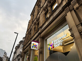 Naklejka premium Manchester Building Society office on a classic city street facade in Manchester UK