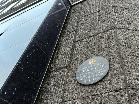 York Hotel site plaque in Manchester showing historic council meetings 1838 to 1840