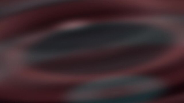 Abstract motion creates dynamic background with swirling patterns and vibrant colors.