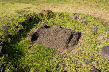 Moai statue with only the face exposed at Ahu Vinapu, Rapa Nui National Park, Easter Island, November 2025