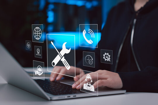 IT support service concept. Technician using laptop to manage online technical assistance, system maintenance, customer support and remote troubleshooting with 24/7 helpdesk, digital service platform,