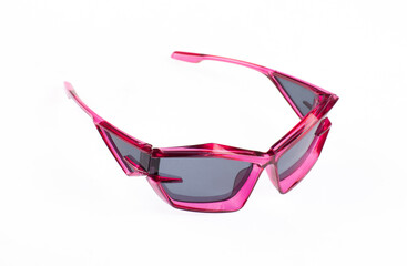 Elegant sport sunglasses with pink frame isolated on white background