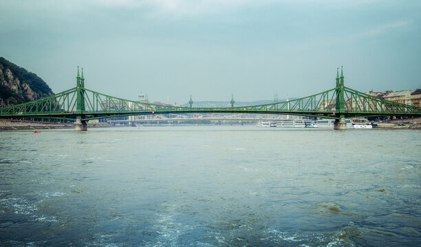 Panoramic view of Liberty Bridge spanning the Danube River in Budapest.