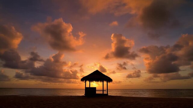 Tranquil Sunset at Beach with Open Gazebo and Serene Waters