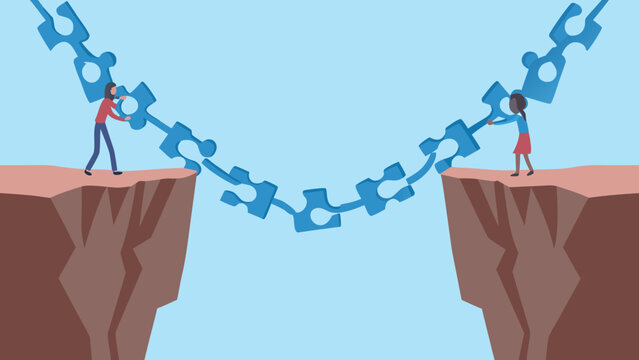 People connecting puzzle pieces to bridge a gap between cliffs