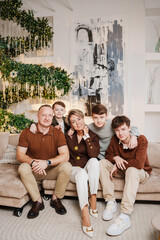 Family gathering in a modern living room during the holiday season