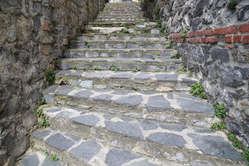 Ancient Masonry Steps between Stone Walls, Traditional Stone Architecture with Stairway