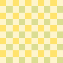 Spring background with pastel yellow and green squares. Cute seamless pattern.