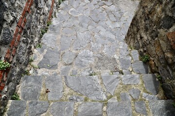 Ancient Masonry Steps between Stone Walls, Traditional Stone Architecture with Stairway