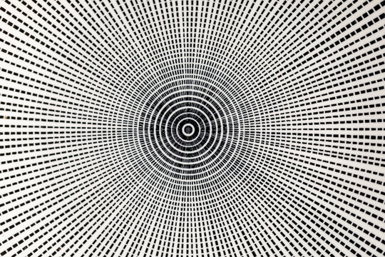 Black and white abstract graphic design of concentric circles and radial lines. Creates a sense of depth and optical ill