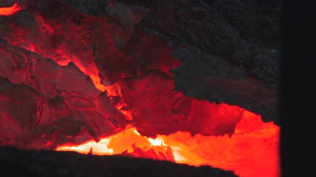 Fiery Molten Landscape. Dramatic Fiery Heat And Molten Cracks Create Vivid Underground Inferno Scene . Stock clip