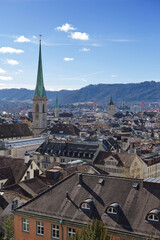 Zurich Skyline with Historic Church Towers and Alpine Backdrop