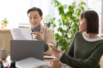 Obraz premium Couple sharing cozy moments at home while enjoying each others company and laughter