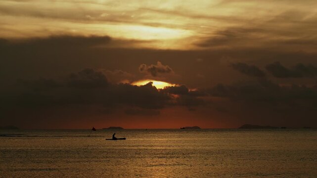 Dramatic red sunset over Lipa Noi beach. Koh Samui, Thailand.