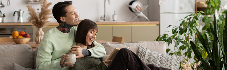 Loving couple enjoys cozy moments together in their welcoming home space