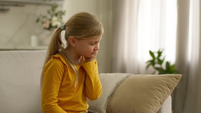Caucasian girl child kid bite eat apple sad upset with tooth pain dental damage offspring eating fruit vitamin feeling painful sensitive teeth medicine health problem at home toothache holding cheek