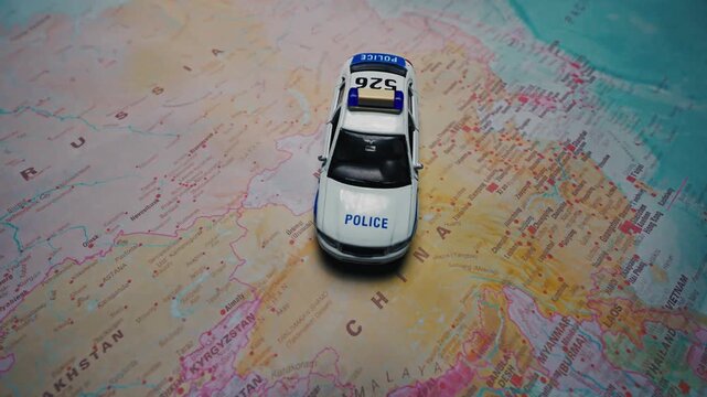 Police car model on map of China.