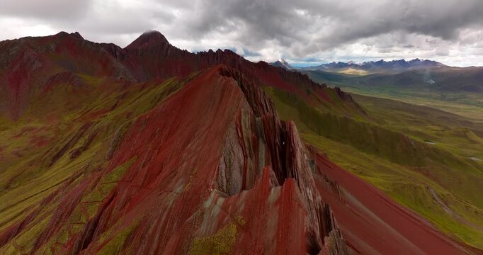 Aerial view of striking Pallay Punchu rainbow mountain in Peruvian Andes