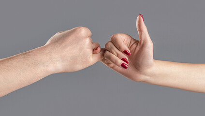 Two people clapping their pinkies together. Finger two hands hold together. Show friendship and...