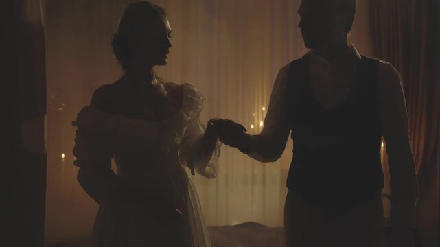 Black silhouette two person, happy couple man offers hand to woman princess. king walking with queen victorian white dress. Night dark room candles light. Adult girl guy love, old style medieval ball