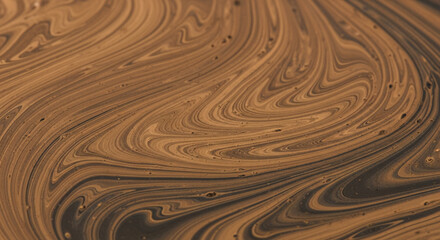 Abstract brown liquid texture swirling close-up background